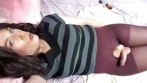 Busty shemale has her pussy and clit fucked in a solo clip