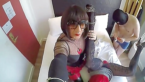 Big tits blonde in a hotel room is fucking with two guys