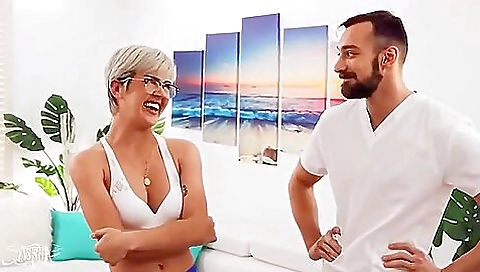 Thick black dildo fucked with a blonde shemale in a massage