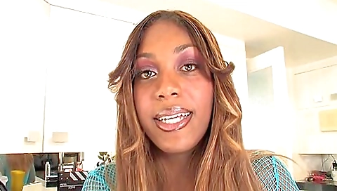 Ebony babe wearing a pink top and ass toying with a cock