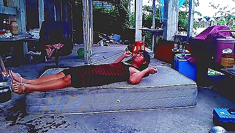 Hot asian brunette lady showing off her body outdoors