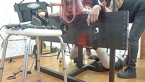 Busty blonde babe caught gagged with a strapon and dildo