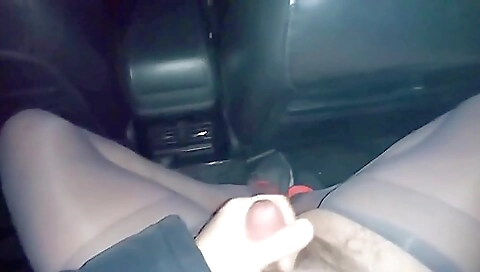 Car porn video of a sexy brunette in sexy stockings