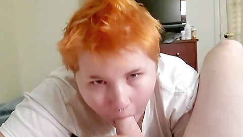 Red-haired babe has sex with a black man in his car