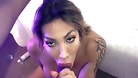 A hot brunette gets deep-throated by her black lover