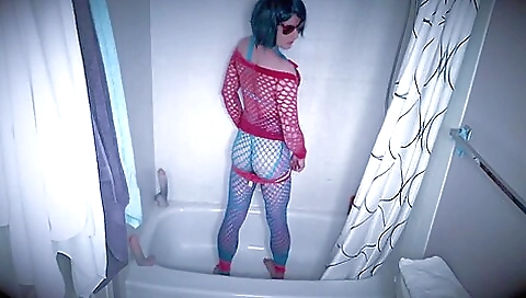 Latina with natural tits enjoying herself in shower